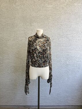 Free People Floral Mock Neck Long Sleeve Top in Black Floral
